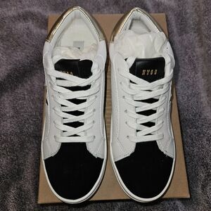 White and Black Sneakers with Gold Accents